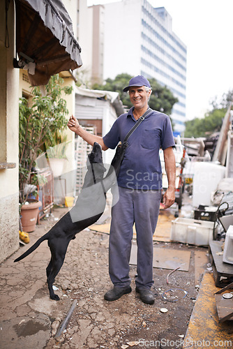 Image of Man, dog and poor poverty in street, lower class and garbage or social economy. Smile, male person and friendly pet in alley with bad infrastructure city, third world or neighbourhood and pollution