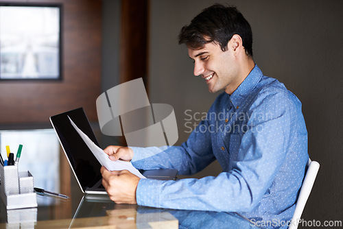 Image of Laptop, documents and business man in office for proposal, project review and company report. Professional, consultant and person with paperwork and computer for information, research and planning