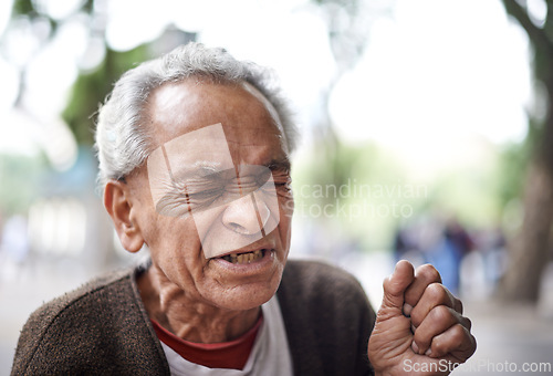 Image of Face, sick and old man sneezing in a street or city in retirement, neighborhood and town. Sao Paulo, flu illness and elderly male person with hay fever, hardship and wisdom in outdoor area and Brazil