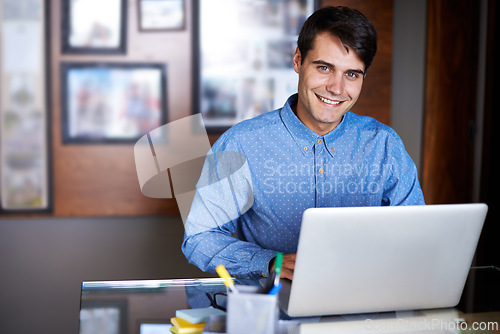 Image of Businessman, laptop and portrait in workplace professional, salesman and working in office. Male person, smile and happy with computer or research, corporate and technology or connectivity or project