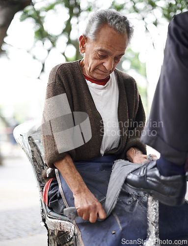 Image of Hands, senior and repairman with polishing shoes for customer in handcraft, startup business in street. Entrepreneur, shoemaker and service with client for leather footwear, skills and professional.