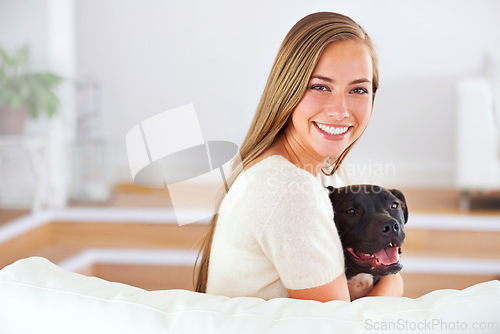Image of Woman, portrait and smile with dog for happiness, love and relax together on couch in living room. Female person, cuddle and puppy on sofa for affection, comfort and stress relief by domestic animal