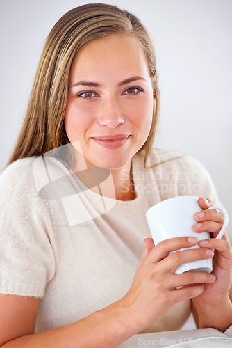 Image of Woman, relax and happy portrait with green tea in morning for healthy detox and wellness in home. Matcha, drink and girl with a smile from calm break or enjoy beverage from coffee cup in apartment