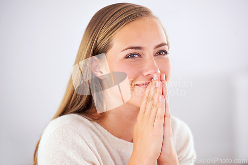 Image of Happy, thinking and woman pray with hope in home for opportunity or gratitude for faith. Spiritual, person and Christian prayer in house for support, insight or thanks to God for inspiration