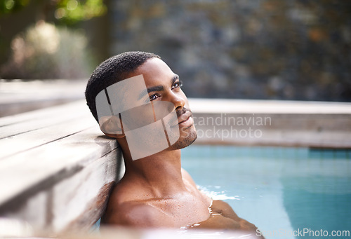 Image of Thinking, pool and water with African man, vacation and holiday outdoors to relax in sunshine. Summer, swimming and happiness for body wellness, calm person and weekend entertainment and ideas