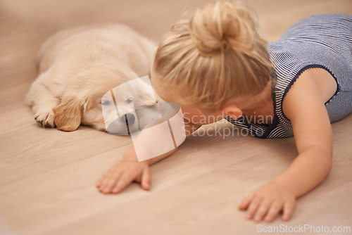Image of Child, puppy and hug with rest, floor and pet with love at house. Kid, dog and golden retriever or sleepy labrador with sleeping, bonding and sharing together with tired look and animals or pets