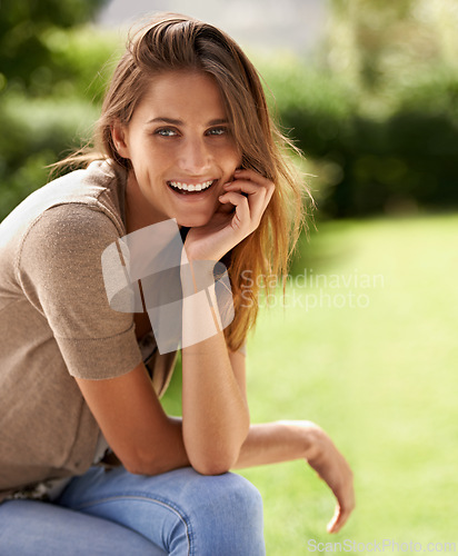 Image of Woman, smile and Spain for relax, outdoor and vacation in outdoor environment in Europe. Female person, happy and confidence in outside, summer and garden background for relaxation and park