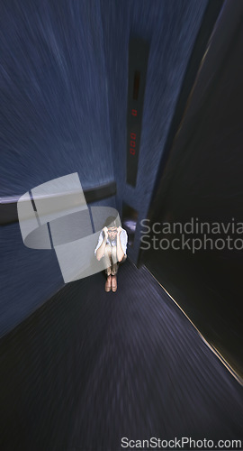 Image of Person, stress and fear elevator with worry for trapped, claustrophobia or anxiety in emergency. Office, lift and woman scared for safety in closed space or panic attack from crisis or horror