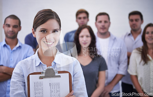 Image of Business, leadership or woman portrait and clipboard in office with team, support or collaboration. Happy, face or recruiter with documents for compliance, hiring and contract or onboarding process