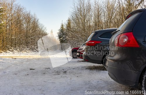 Image of parking lot near winter forest