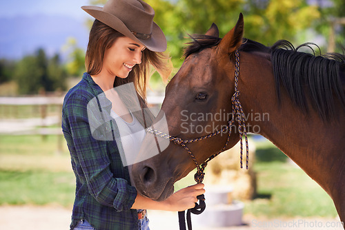 Image of Cowgirl, smile and woman with horse at farm outdoor in summer or nature in Texas for recreation. Western, happy female person and animal at ranch, pet or stallion in the rural countryside together