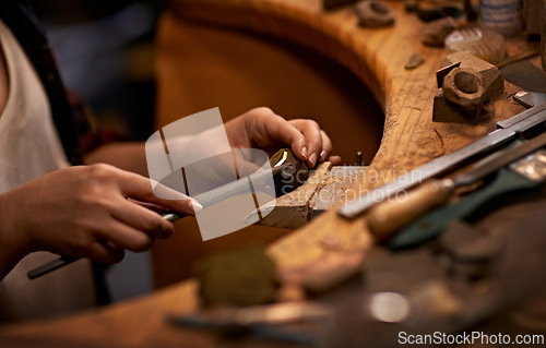 Image of Woodworking, industrial and hands of woman in workshop for creative project or sculpture. Artisan, industry and closeup of female carpenter manufacturing products in studio for small business.