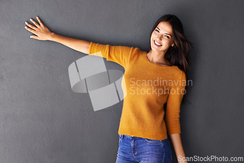 Image of Happy, portrait and woman with hand on studio space for announcement, offer or news info on black background. Mockup, face and female model show deal announcement, review, feedback or deal promotion