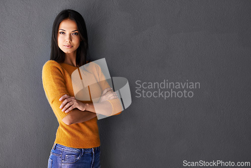 Image of Portrait, mockup and face of lady in fashion with confidence, clothes and marketing space isolated on gray background. Female person, woman and model for outfit, stylish and fashionable in studio