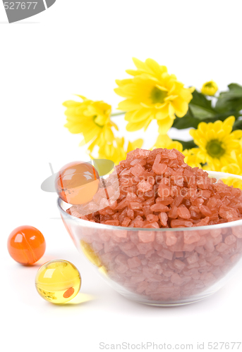 Image of spa pruducts and yellow flowers