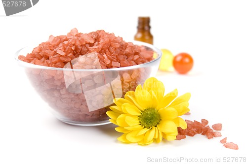 Image of bath salt, oil balls in a bowl and flower