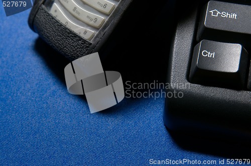 Image of Phone And Computer Keyboard Detail