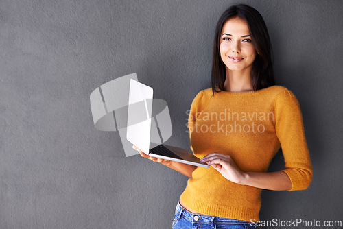 Image of Woman, portrait and laptop with mockup in studio for social media, download or website scroll on black background. Space, pc or student face online with internet, elearning or upskill training course