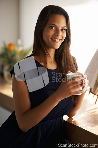 Image of Woman, home and kitchen counter with smile for coffee at confident break with happiness, enjoy and relax. Portrait, person and satisfied in morning for leisure, chill and positivity for self care