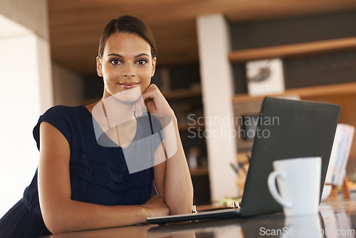 Image of Woman, portrait and laptop in apartment with coffee for morning research as freelance journalist, online or remote work. Female person, face and mug in kitchen for internet report, startup or job