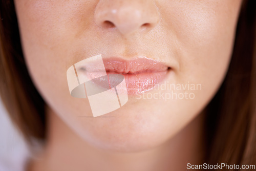 Image of Woman, lipstick and mouth closeup for beauty cosmetics for makeup skincare with gloss, treatment or filler. Female person, product and aesthetic wellness in Canada for spa hygiene, wellbeing or care
