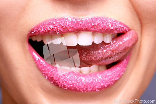 Image of Lipstick, sugar and woman with tongue out, beauty and makeup with creativity and scrub for exfoliation treatment. Sweet, flirt and lick for fun and pink aesthetic, art and cosmetology with cosmetics