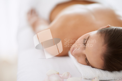 Image of Relax, massage and girl on bed at spa for health, wellness and balance with luxury holistic treatment. Self care, sleep and woman on table for body therapy, comfort and calm pamper service at hotel