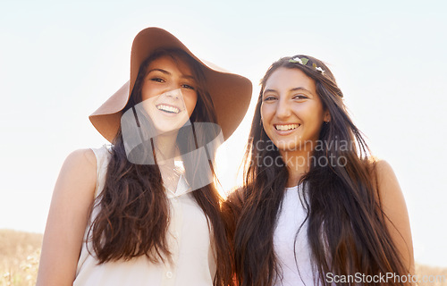 Image of Portrait, summer and field with women, friends and smile with vacation and countryside with journey. Face, girls or people with weekend break and nature with holiday, adventure or windy with sunshine