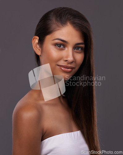 Image of Salon, hair care and portrait of woman on gray background for healthy texture, wellness and beauty. Shine, hairdresser and face of person with hairstyle for treatment, cosmetics and growth in studio