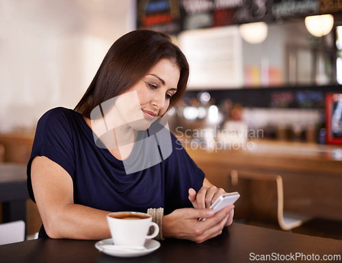 Image of Woman, reading and phone on social media in cafe and customer relax with latte in restaurant. Happy, person and scroll smartphone online with news, article or review coffee shop on blog website