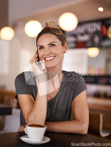 Image of Happy woman, phone call and communication with coffee at cafe for conversation or networking. Female person with smile and talking on mobile smartphone for friendly discussion at indoor restaurant