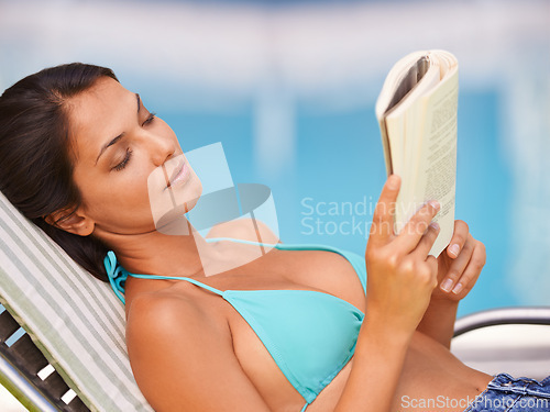 Image of Woman, bikini and swimming pool relax or reading book for holiday vacation at hotel accommodation, summer or resting. Female person, swimwear and Hawaii trip for travel resort, tanning or peaceful