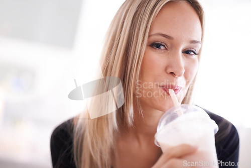 Image of Woman, milkshake and portrait for relax with smoothie and nutrition with straw and strawberry flavor. Young person and smiling with beverage or drink for fruits, detox and dairy for joyful on mockup