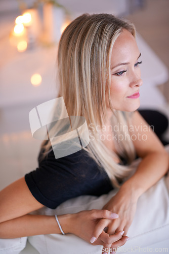 Image of Face, relax and thinking with woman on sofa in living room of home for break, time off or wellness. Future, idea and vision with confident young person in lounge of apartment for quiet contemplation