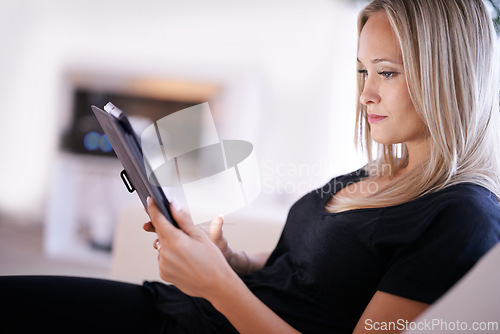 Image of Tablet, search and woman on sofa with internet, scroll or social media, ebook or streaming at home. Digital, app or female person in a living room online with google it, sign up or netflix and chill