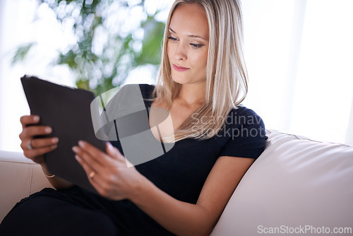 Image of Relax, calm and woman with tablet on sofa for social media, streaming or web, search and communication at home. Digital, app and female person in house with google it, sign up or Netflix and chill