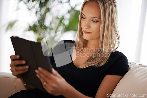 Image of Calm, relax and woman with tablet on a sofa for social media, streaming or web, search or reading ebook at home. Digital, app and female person in a house with google it, sign up or Netflix and chill