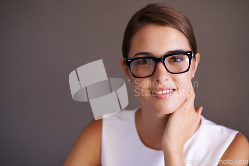 Image of Happy woman, portrait and glasses with frame in studio and trendy eyewear for optometry. Model, smile face and business person in fashion spectacles, vision and prescription lens by brown background