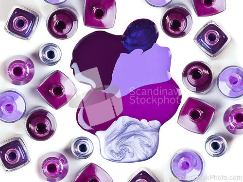 Image of Nail, polish or bottle to spill in luxury, cosmetology or beauty aesthetic as manicure and pedicure. Creative art, varnish or color paint pattern as liquid drip effect in studio on white background