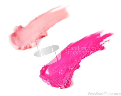 Image of Smeared, studio and isolated glossy lipstick, makeup and cosmetics on white background. Trendy, bright colour for creative beauty with artistic and texture smudged in beautiful vibrant pink shades