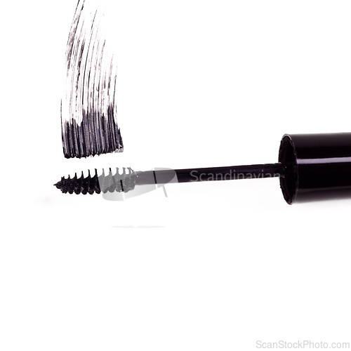 Image of Brush, mascara and stroke of makeup, eyelash and cosmetics for beauty, color or creativity isolated on white background. Abstract, tools or smudge of product for test, art or cosmetology in studio