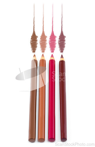 Image of Cosmetics, makeup and beauty with lip liner, tool and example of results of color on white background. Studio, aesthetic and pencil for drawing, product and art with set for choice of application