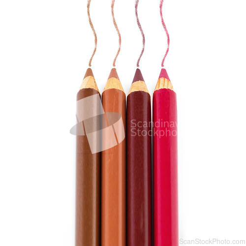 Image of Makeup, pencil and colourful with cosmetic tools, facial and industry isolated on a white studio background. Mockup space, beauty product and aesthetic with creative and artistic with technique