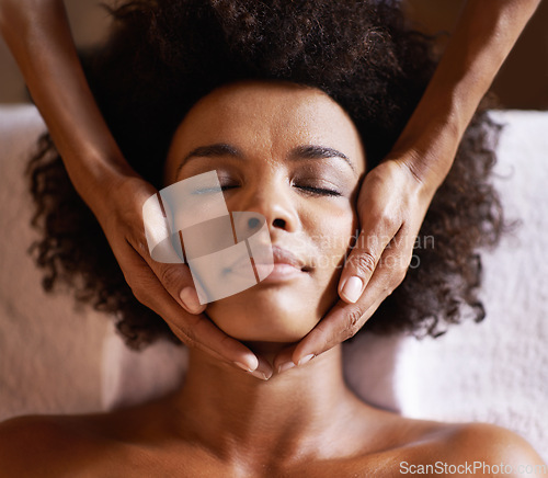 Image of Woman, spa and massage hands on face with towel, facial and treatment for wellness and care. Skincare, relax and calm African female person with skin glow and natural beauty at hotel or resort