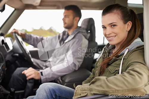 Image of Couple, car and portrait on road trip with travel for adventure, vacation and anniversary getaway with happiness in nature. Woman, man and driving in vehicle for holiday journey, tourism or honeymoon