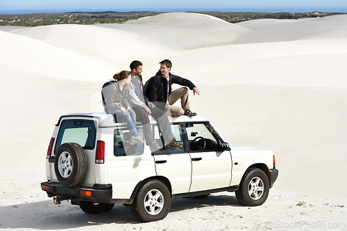 Image of Relax, car and friends sitting on roof for off road drive, summer holiday and communication in sand dune. Car, transportation and people in nature for getaway vacation, travel and journey in Mexico
