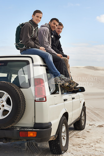 Image of Road trip, people and sitting on jeep, portrait and route for sightseeing and driving adventure in nature. Friends, traveller and happy face on holiday by blue sky, journey and leisure on vehicle