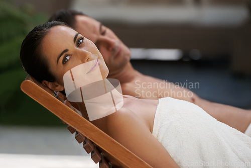 Image of Portrait, relax and couple at hotel pool with smile, sleep and holiday together at wellness spa getaway. Hospitality, happy woman and man at luxury villa for travel, vacation or love on romantic date