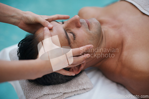 Image of Spa, man and hands with massage for relax at resort, luxury hotel and vacation for wellness and therapeutic pamper. People, masseuse and body care with head treatment, hospitality and zen by poolside