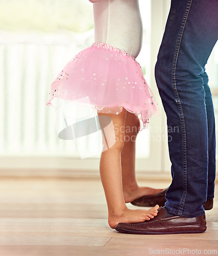 Image of Legs, feet with father and child dancing, teaching and learn with music and rhythm at family home. Man, young girl and standing together with activity for bonding, ballet with safety and support